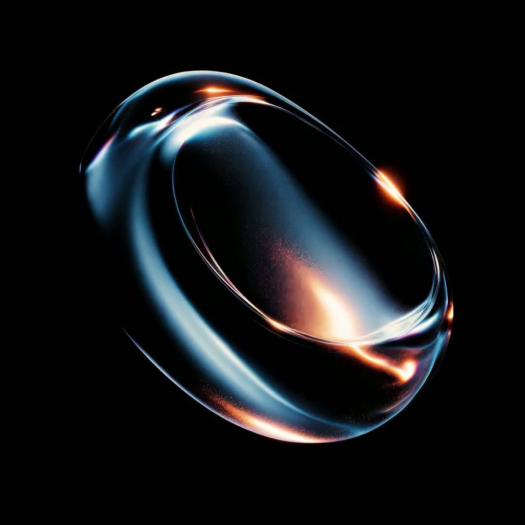 Clear glass torus on black, lit from inside with orange and pale blue — one of the 160 Materials