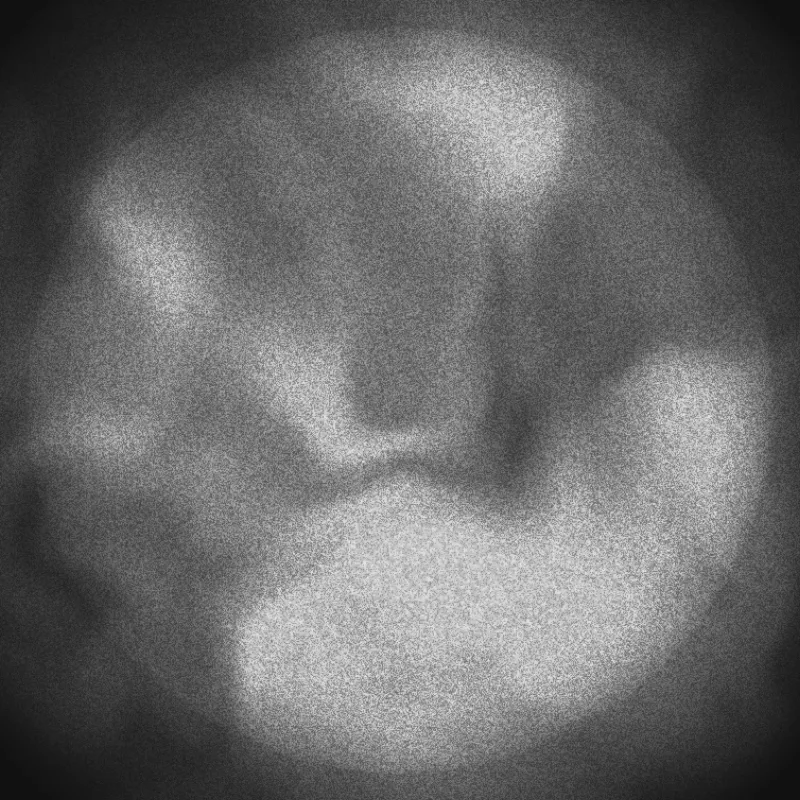 Churning marbled cloud in soft grain, lit like a photograph of polished stone — luxurious backdrop for a premium product page