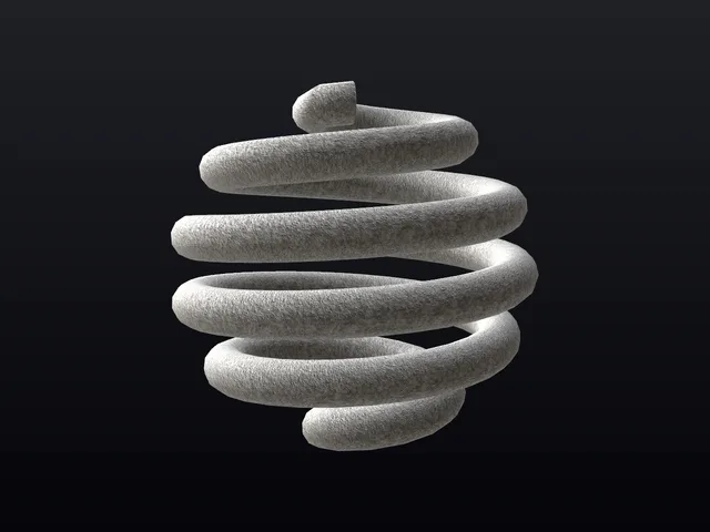 Concrete coil ball — A wound coil cast in rough concrete.